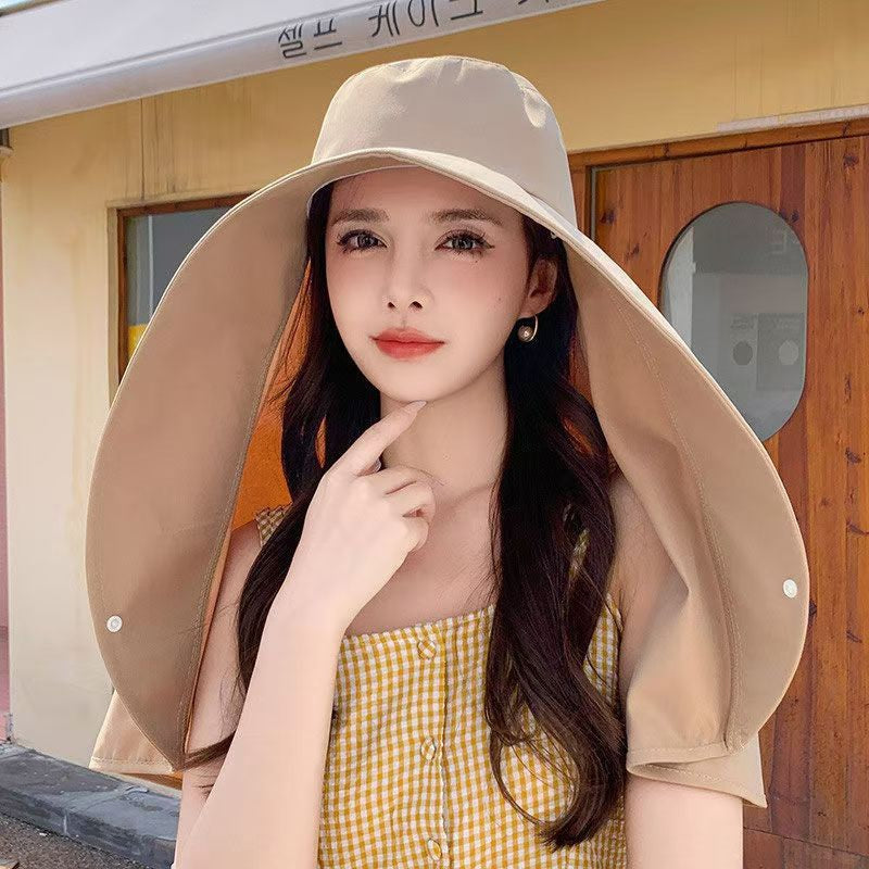 Women's wide brim bucket hat with UV protection