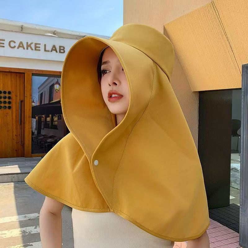 Women's wide brim bucket hat with UV protection
