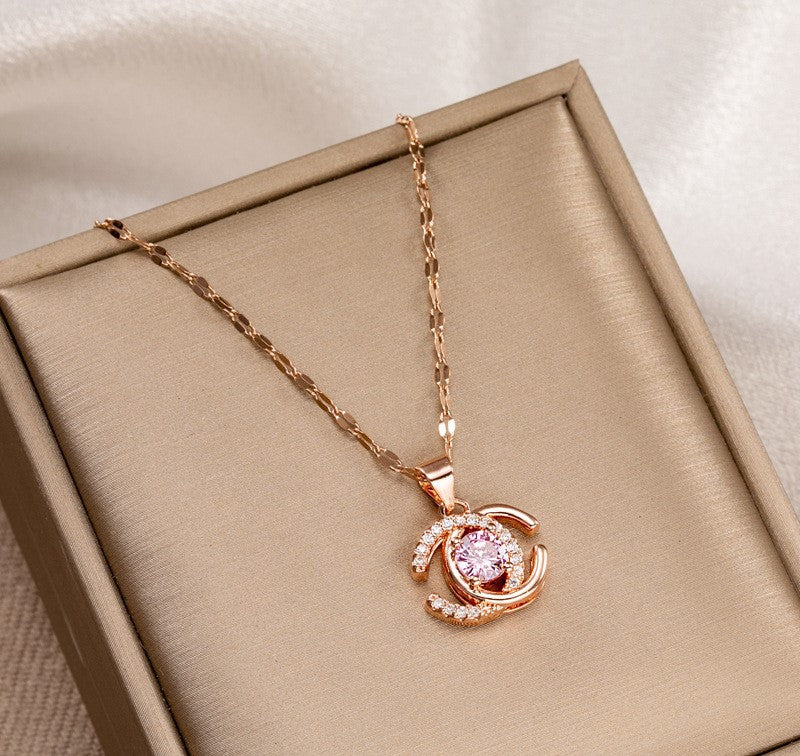 Double C Zircon Golden Pendant