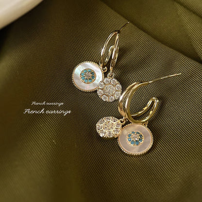 Shell zircon earrings