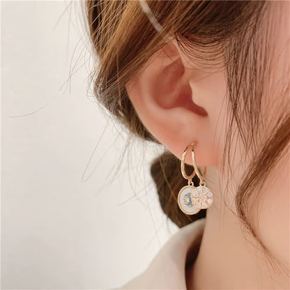Shell zircon earrings
