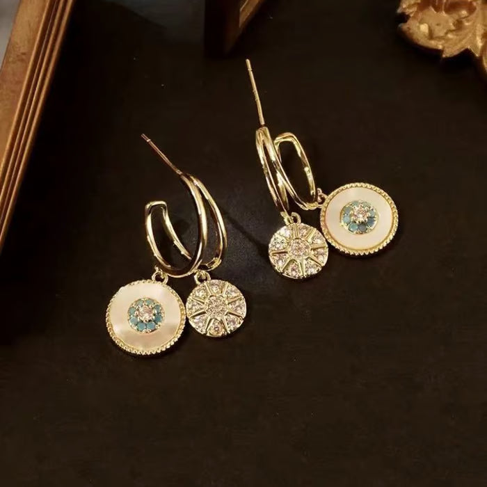 Shell zircon earrings