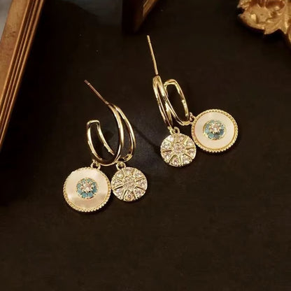 Shell zircon earrings