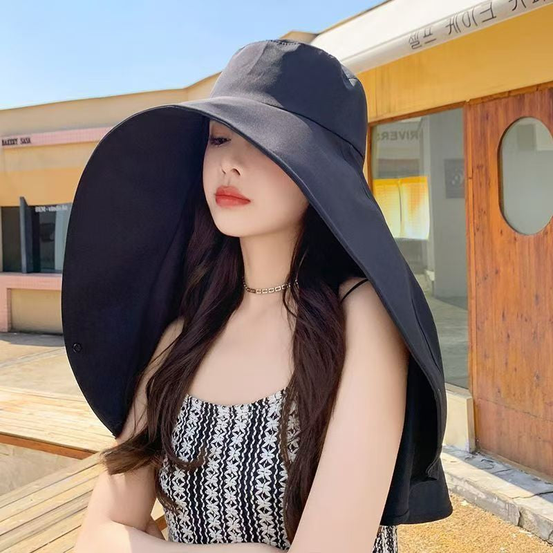 Women's wide brim bucket hat with UV protection