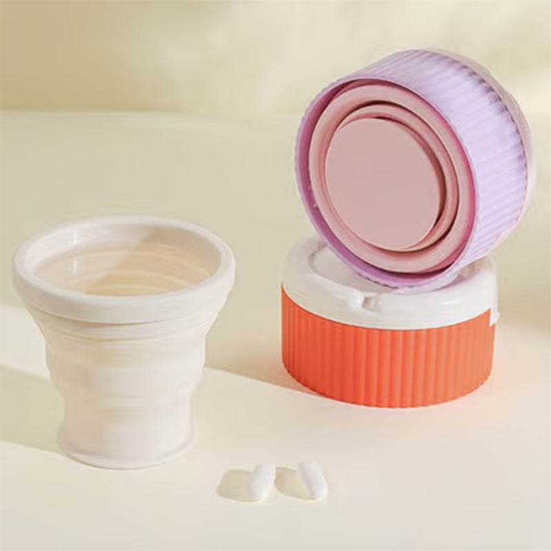 Pill organizer with collapsible silicone cup
