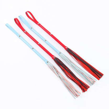 Long-handled leather whip