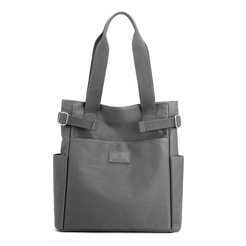 Large capacity multi-compartment canvas handbag