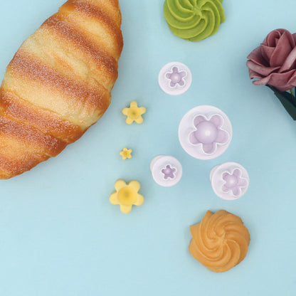 Spring-loaded cookie press tool