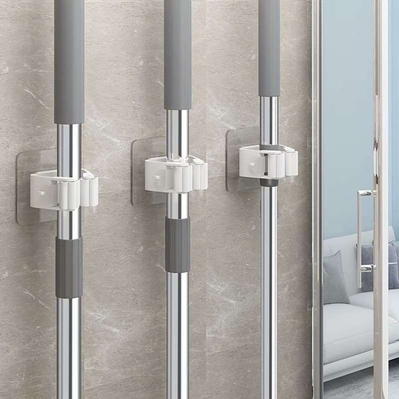 🧹 Strong Adhesive No-Drill Mop Holder Keep Your Home Clean, Organized & Clutter-Free!