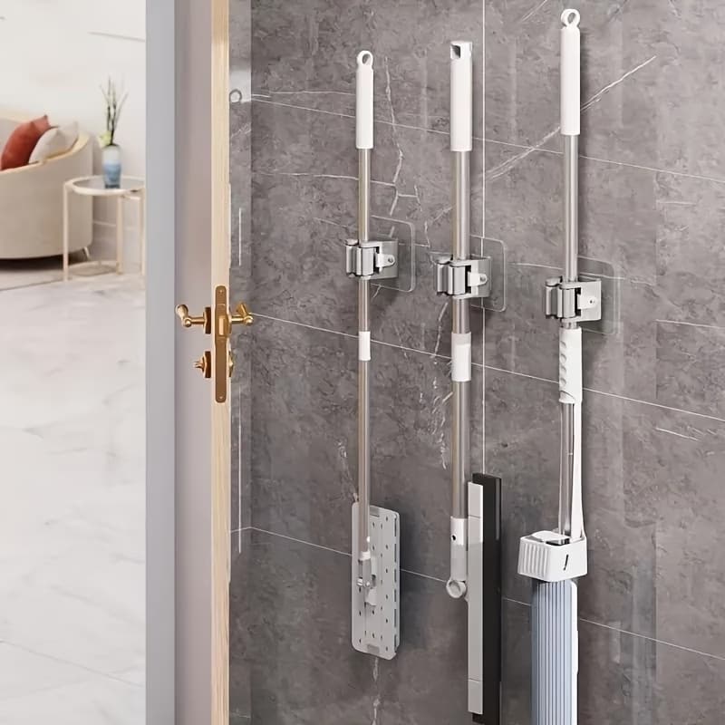 🧹 Strong Adhesive No-Drill Mop Holder Keep Your Home Clean, Organized & Clutter-Free!