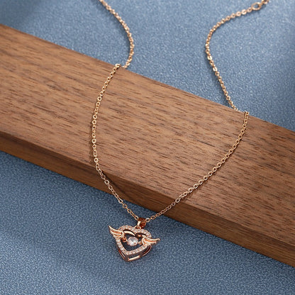 Moving Diamond Zircon Angel Wings Heart Pendant